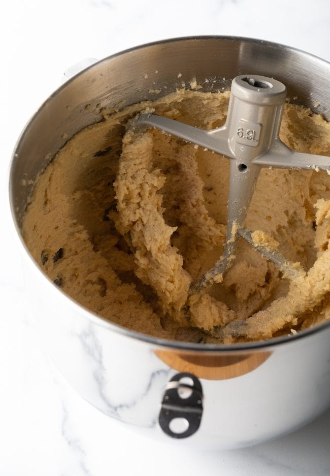large standing mixing bowl with raw dough