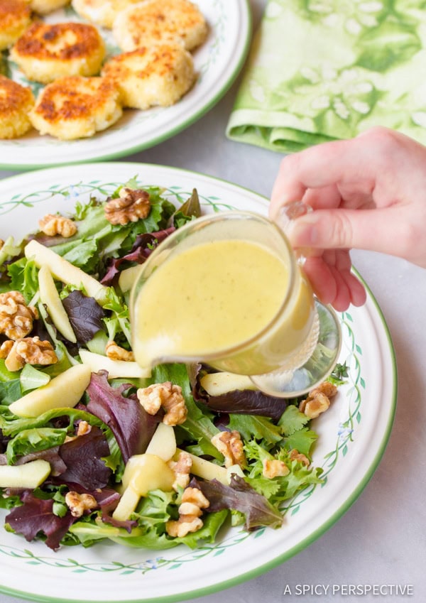  Goat Cheese Salad - pouring dressing over the greens
