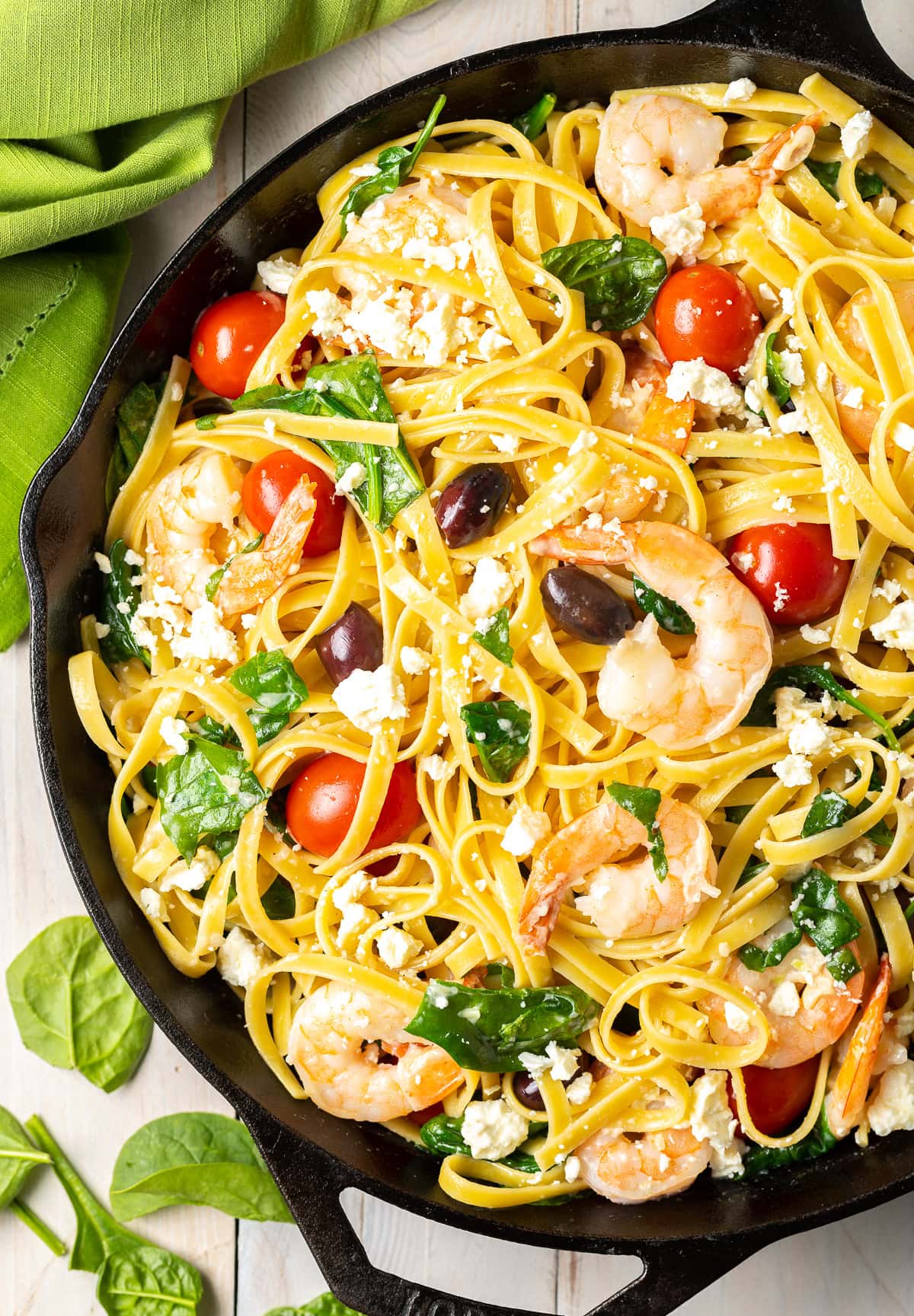 Creamy-Greek-Shrimp-Pasta Greek shrimp pasta in a cast iron skillet.
