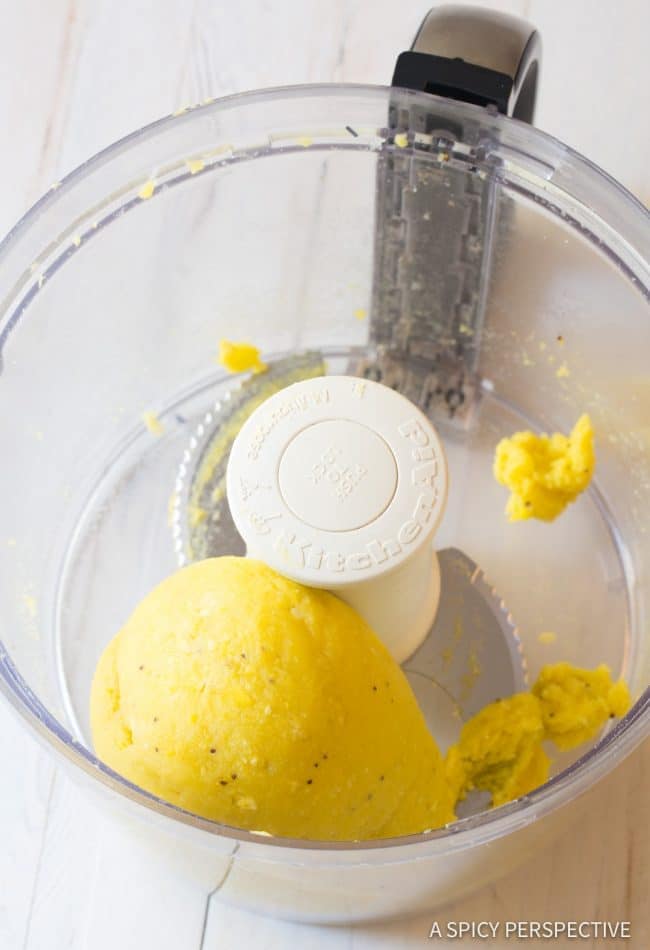 Plantains blended into a ball in a food processor.