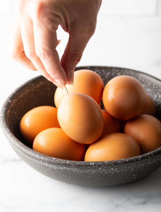pricking eggshells before boiling