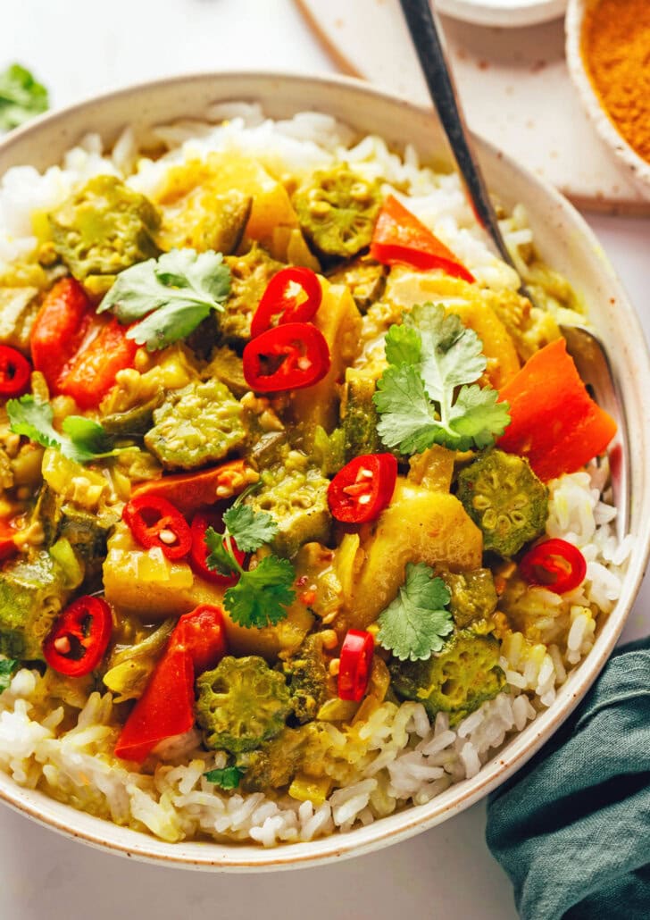 Crockpot Potato Curry front view with rice and okra