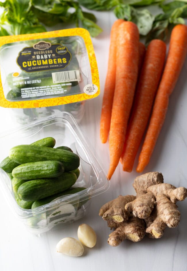 Recipe ingredients: Carrots, mini cucumbers, fresh ginger.