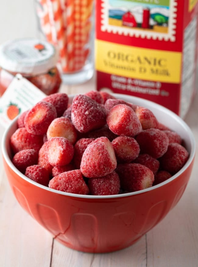 Bowl of frozen strawberries. 