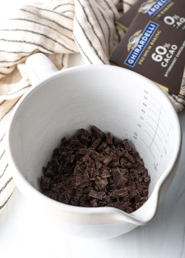 chopped chocolate in a measuring cup
