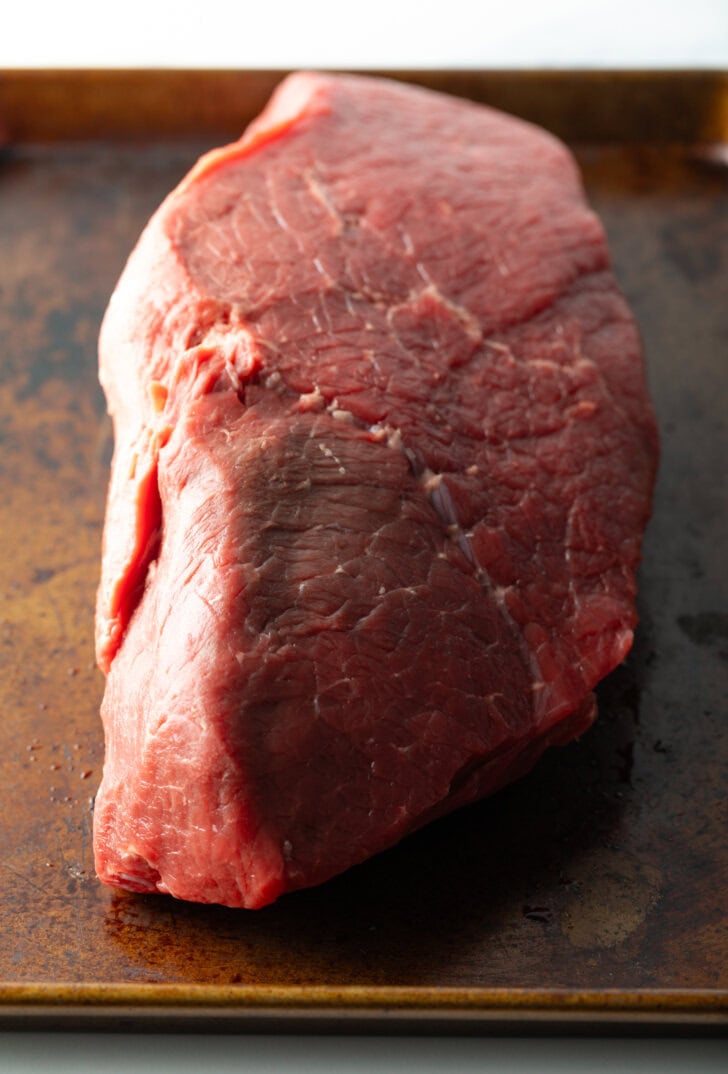 Large raw top roast.