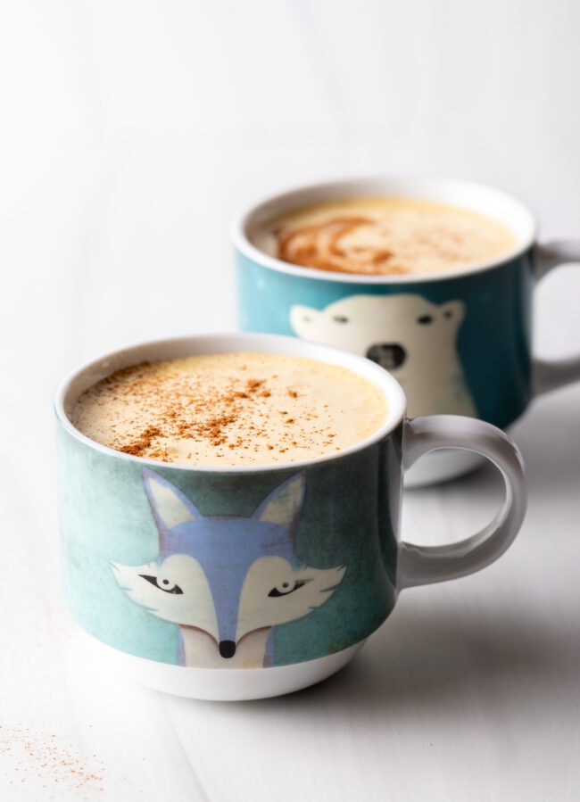 Two mugs of Vietnamese egg coffee.