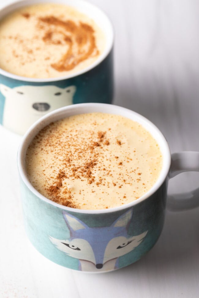 Two mugs of Vietnamese egg coffee.